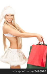 picture of cheerful santa helper with shopping bags