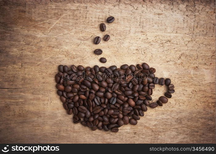 picture of coffee beans on a wooden background