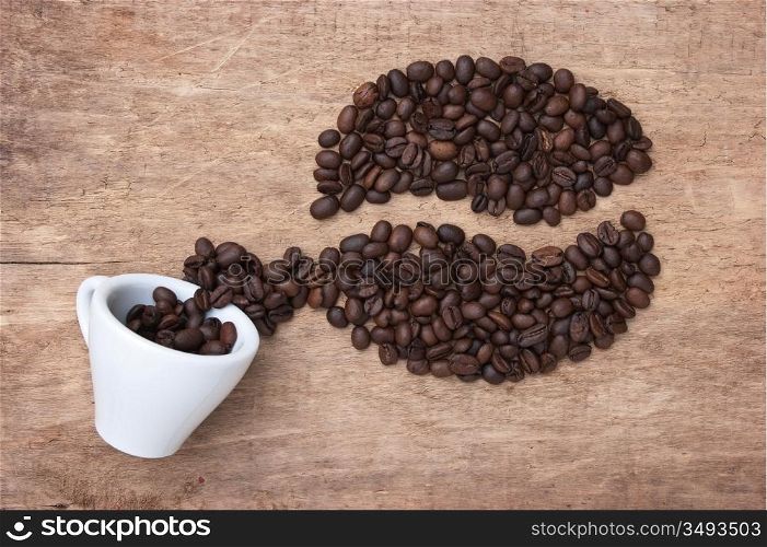 picture of coffee beans on a wooden background