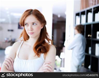 picture of couple in disagreement at home in the living room
