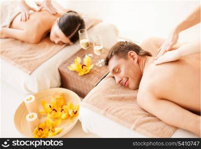 picture of couple in spa salon getting massage