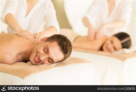picture of couple in spa salon getting massage. couple in spa