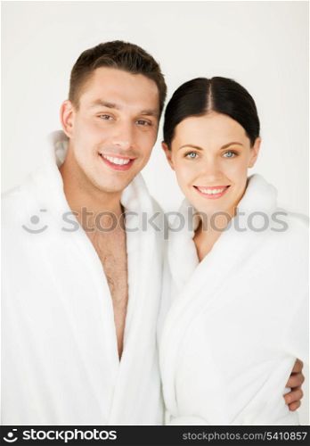 picture of couple in spa salon in white bathrobes