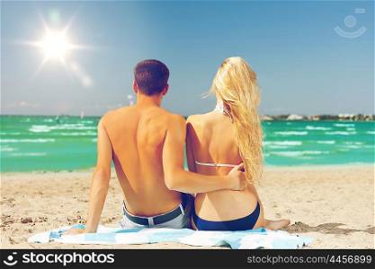 picture of couple sitting on the beach. couple sitting on the beach