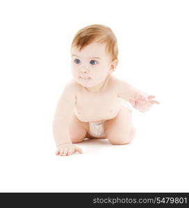 picture of crawling baby boy in diaper over white