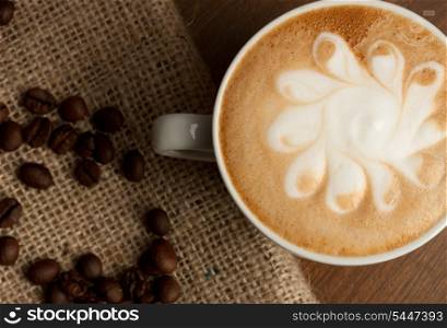 picture of cup of coffee and beans