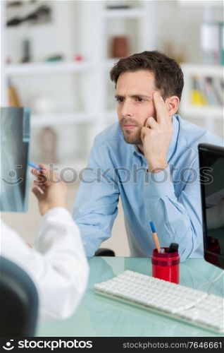 picture of despair young businessman during consultation