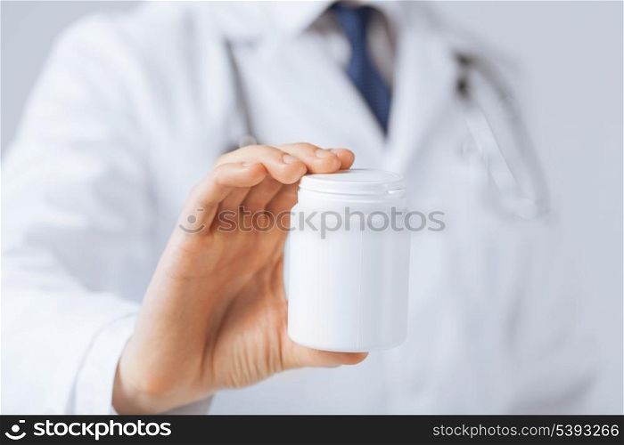 picture of doctor hands holding white pack