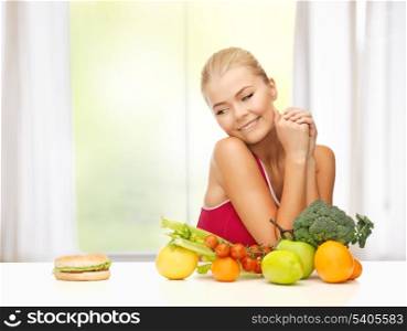 picture of doubting woman with fruits and hamburger