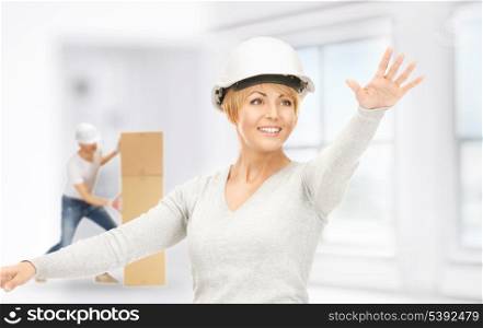 picture of female contractor and builder working indoors