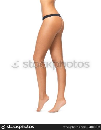 picture of female legs in black bikini panties