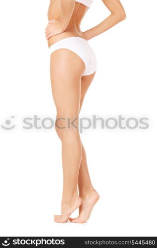 picture of female legs in white bikini panties