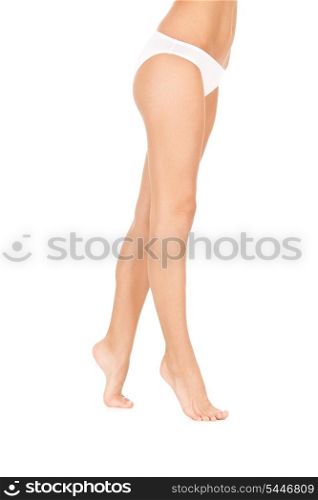 picture of female legs in white bikini panties
