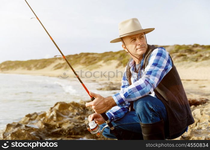 Picture of fisherman . Picture of fisherman fishing with rods