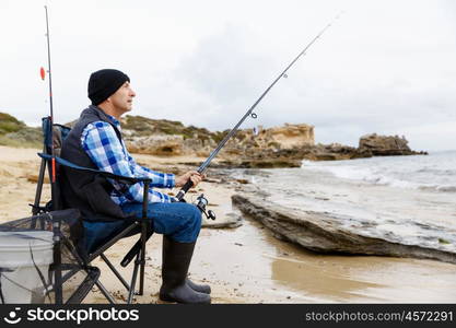 Picture of fisherman . Picture of fisherman fishing with rods