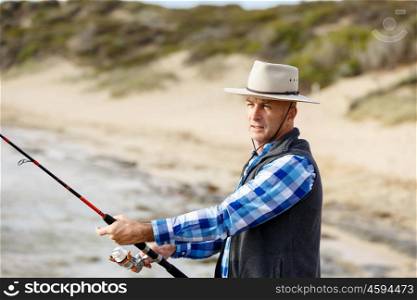 Picture of fisherman . Picture of fisherman fishing with rods