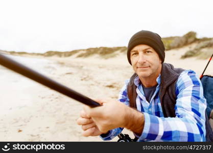 Picture of fisherman . Picture of fisherman fishing with rods