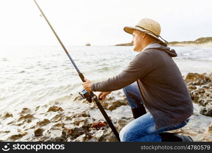 Picture of fisherman . Picture of fisherman fishing with rods