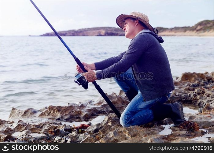 Picture of fisherman . Picture of fisherman fishing with rods