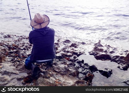 Picture of fisherman . Picture of fisherman fishing with rods