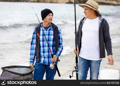 Picture of fisherman . Picture of fishermen fishing with rods