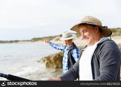 Picture of fisherman . Picture of fishermen fishing with rods