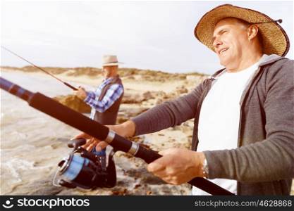 Picture of fisherman . Picture of fishermen fishing with rods