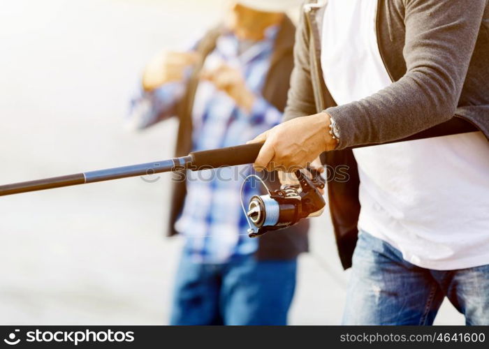 Picture of fisherman . Picture of fishermen fishing with rods