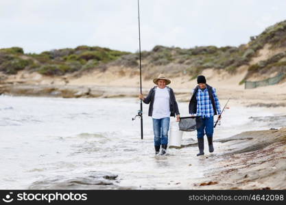 Picture of fisherman . Picture of fishermen fishing with rods