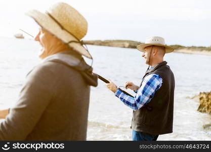 Picture of fisherman . Picture of fishermen fishing with rods