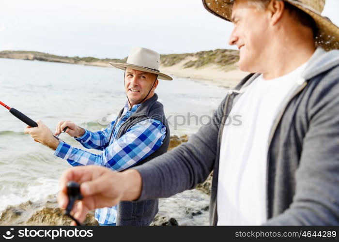 Picture of fisherman . Picture of fishermen fishing with rods