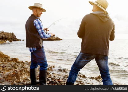 Picture of fisherman . Picture of fishermen fishing with rods