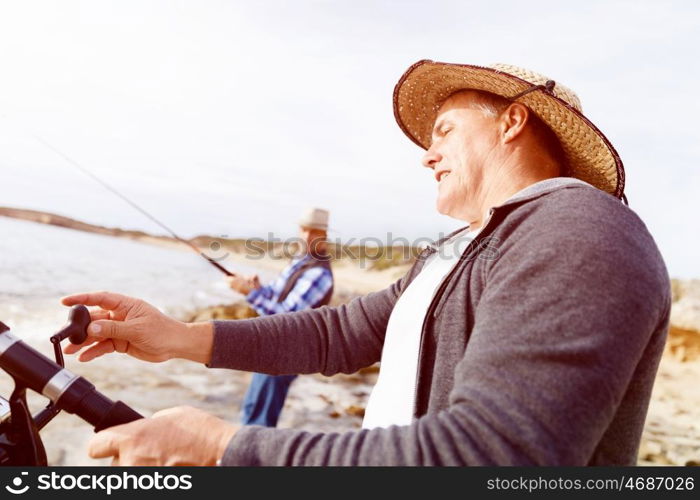 Picture of fisherman . Picture of fishermen fishing with rods