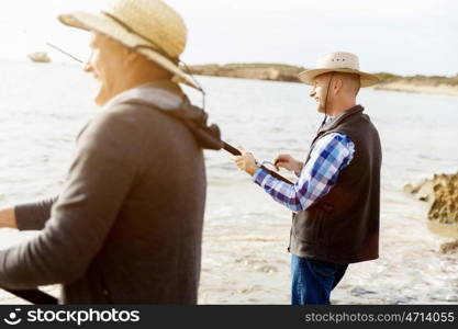 Picture of fisherman . Picture of fishermen fishing with rods