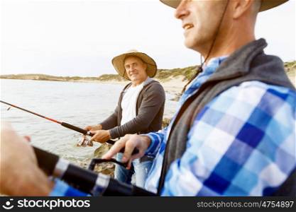 Picture of fisherman . Picture of fishermen fishing with rods