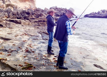 Picture of fisherman . Picture of fishermen fishing with rods