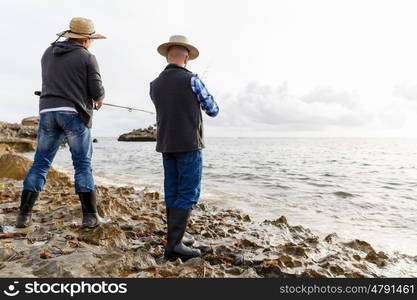 Picture of fisherman . Picture of fishermen fishing with rods