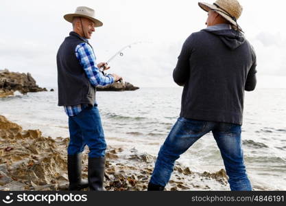 Picture of fisherman . Picture of fishermen fishing with rods