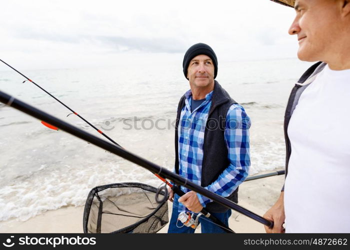 Picture of fisherman . Picture of fishermen fishing with rods