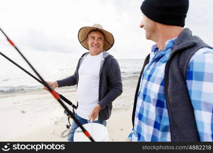 Picture of fisherman . Picture of fishermen fishing with rods