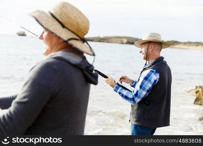 Picture of fisherman . Picture of fishermen fishing with rods