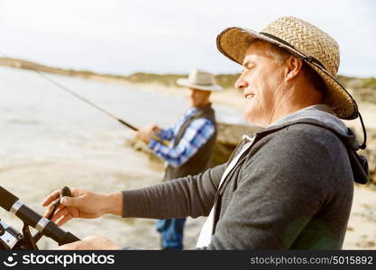 Picture of fisherman . Picture of fishermen fishing with rods