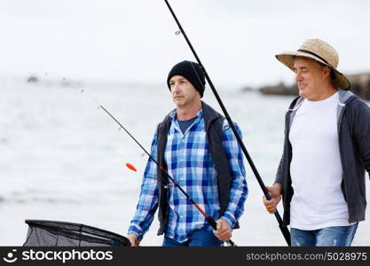 Picture of fisherman . Picture of fishermen fishing with rods