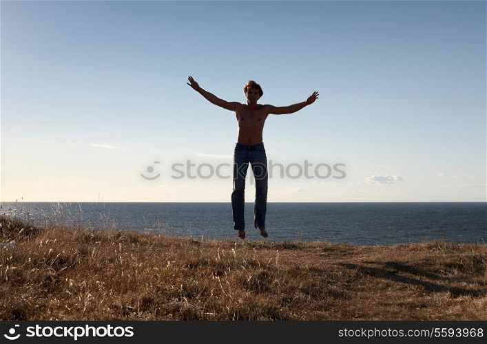 picture of fit man levitating