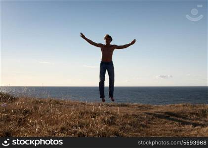 picture of fit man levitating