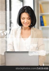 picture of friendly businesswoman with laptop computer and virtual screen