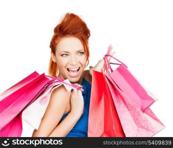 picture of funny woman with shopping bags .