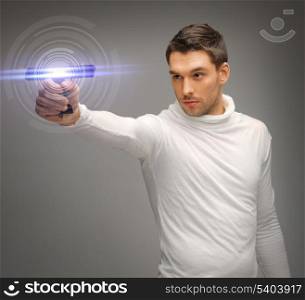 picture of futuristic man with sci fi weapon