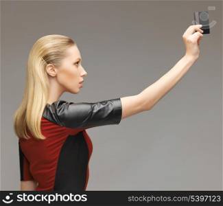 picture of futuristic woman with access card.