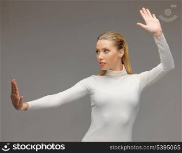picture of futuristic woman working with something imaginary